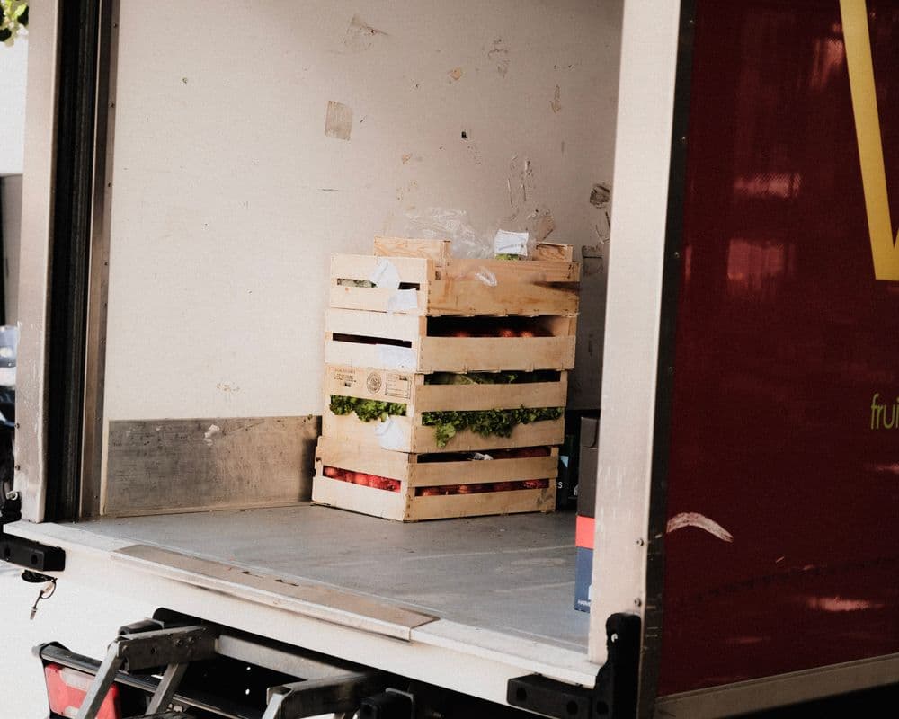 Groceries being carefully packed for delivery
